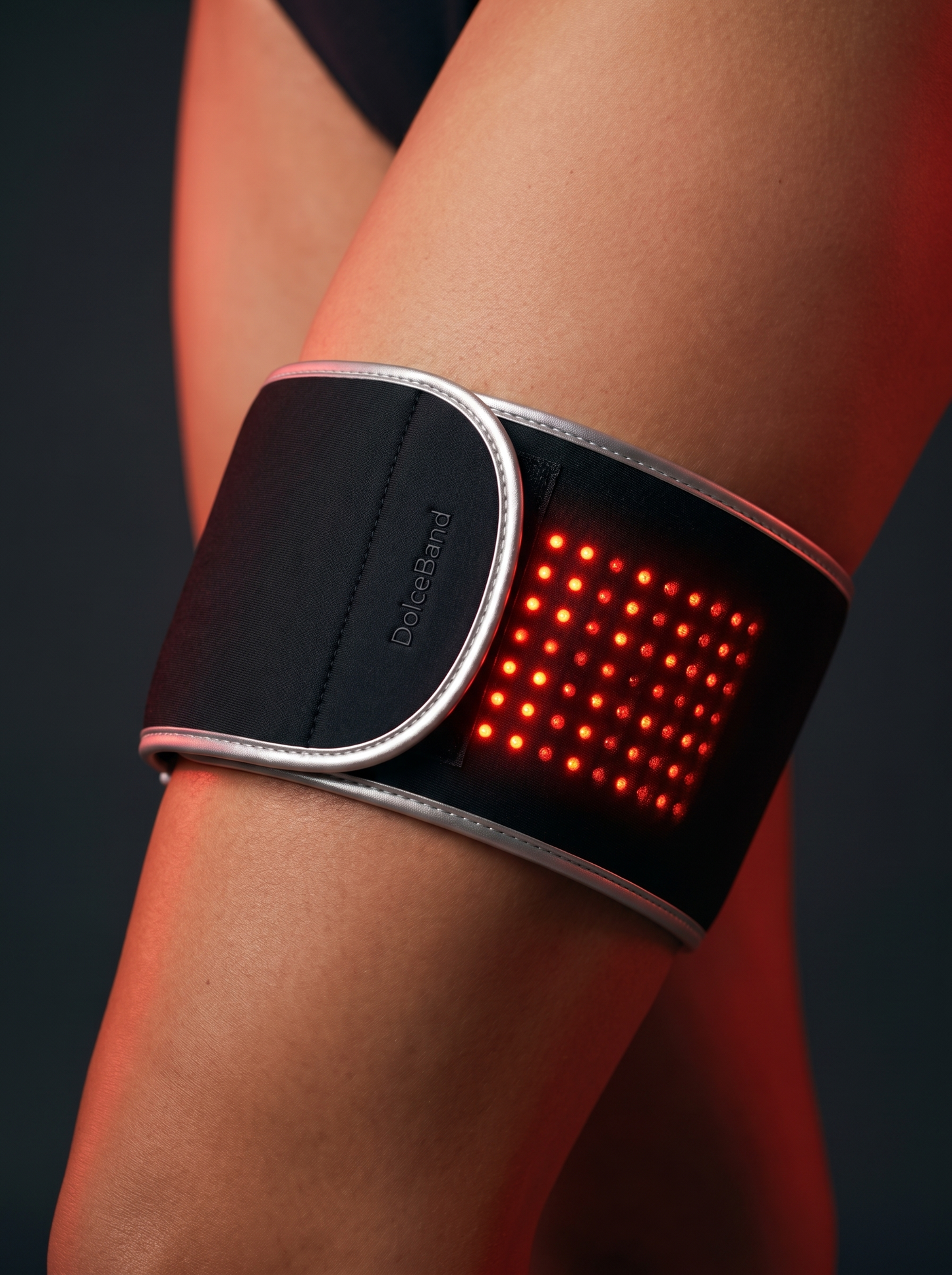 PhotoMed BandV2 closeup — wordmark and red LED grid